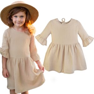 beżowa sukienka muślinowa bawełniana dla dziewczynki letnia na upały muślin bawełna gładka z rękawkami wiązana na karku naturalna polska ciuchciuch