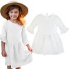 biała sukienka muślinowa bawełniana dla dziewczynki letnia na upały muślin bawełna gładka z rękawkami wiązana na karku naturalna polska ciuchciuch